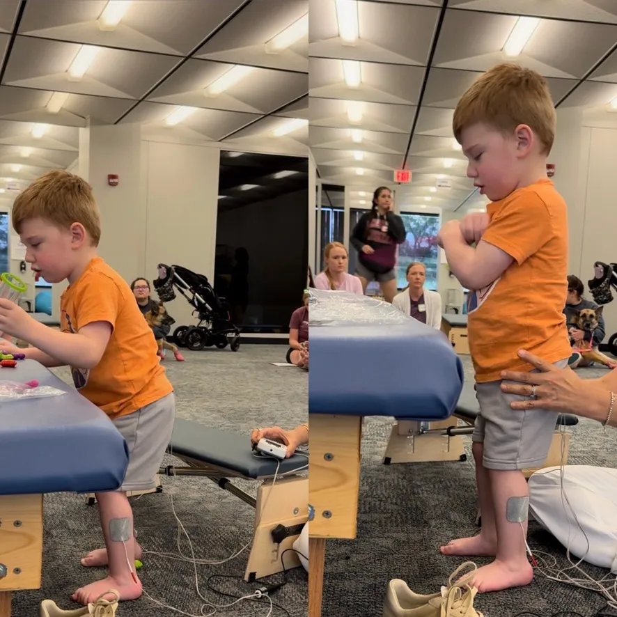 Two views of a young boy in an orange shirt standing beside a therapy table with electrodes on his lower legs